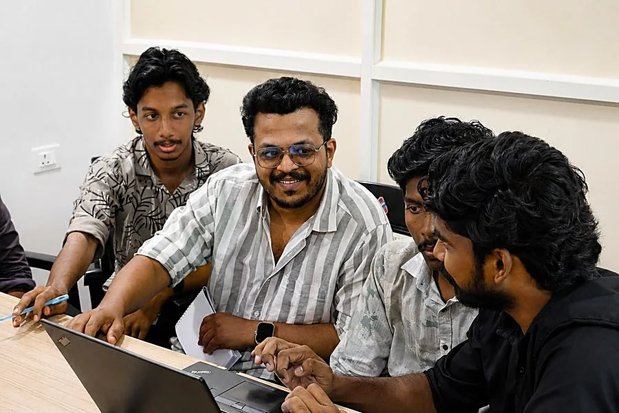 Cokonet learners working through a project together at the Trivandrum office